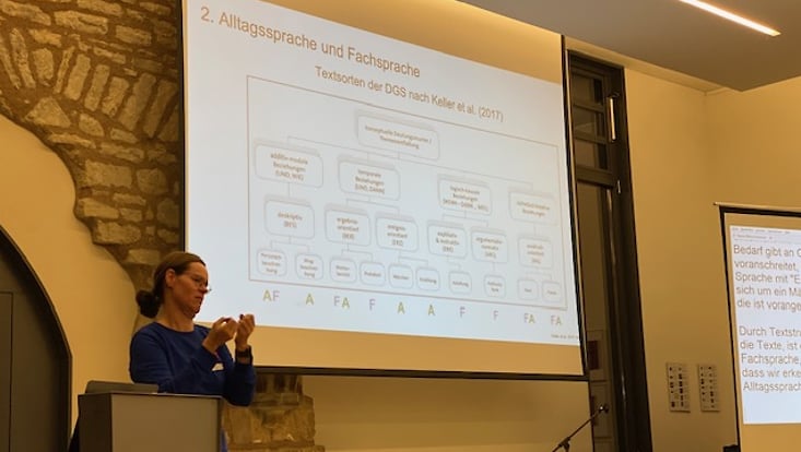 Vortragende auf der Bühne/ Presenter on stage
